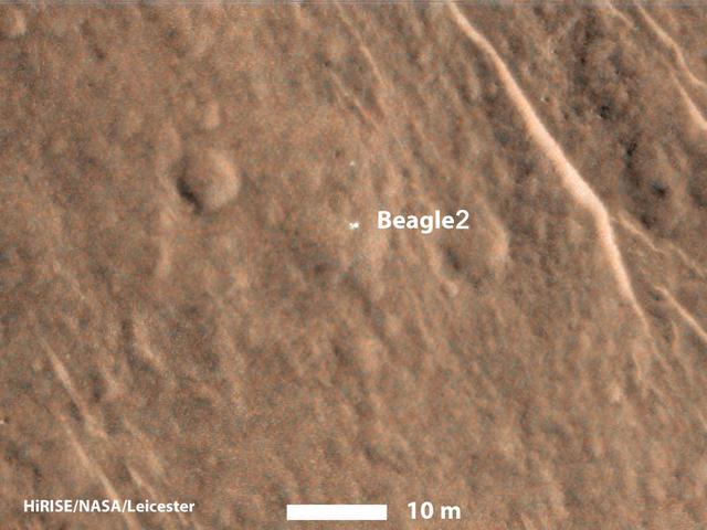 This annotated image taken on Dec. 15, 2014 by NASA Mars Reconnaissance Orbiter shows a bright feature interpreted as the United Kingdom Beagle 2 Lander, which was never heard from after its expected Dec. 25, 2003, landing.