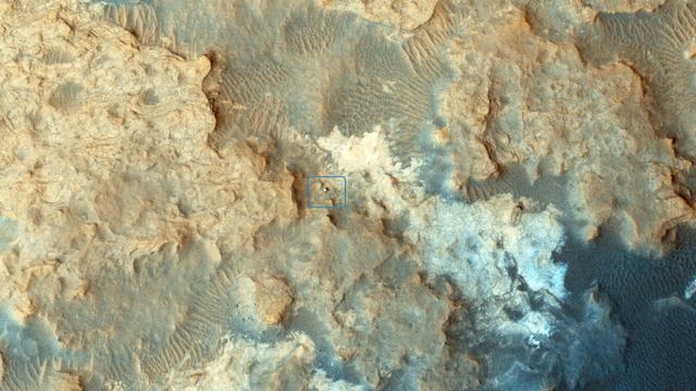 NASA Curiosity Mars rover can be seen at the Pahrump Hills area of Gale Crater in this view from the High Resolution Imaging Science Experiment HiRISE camera on NASA Mars Reconnaissance Orbiter.