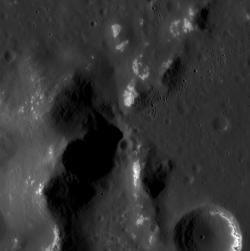 The surface shown here is located within a 73-km-diameter crater; the mounds are part of a larger central peak structure of the hosting crater. The resolution of this image resolves hollows on the central peaks, as seen in other craters such as Ahmad Baba, Mickiewicz, and others. The lower right also shows hollows that appear to form in one layer of a crater wall, such as has been viewed in other high-resolution images.  This image was acquired as part of the NAC ride-along imaging campaign. When data volume is available and MDIS is not acquiring images for its other campaigns, high-resolution NAC images are obtained of the surface. These images are designed not to interfere with other instrument observations but take full advantage of periods during the mission when extra data volume is available.  Date acquired: January 12, 2015 Image Mission Elapsed Time (MET): 63406030 Image ID: 7783973 Instrument: Narrow Angle Camera (NAC) of the Mercury Dual Imaging System (MDIS) Center Latitude: 59.57° Center Longitude: 319.14° E Resolution: 15 meters/pixel Scale: This image is roughly 15 km (9 miles) across Incidence Angle: 67.9° Emission Angle: 22.1° Phase Angle: 90.1°  http://photojournal.jpl.nasa.gov/catalog/PIA19187