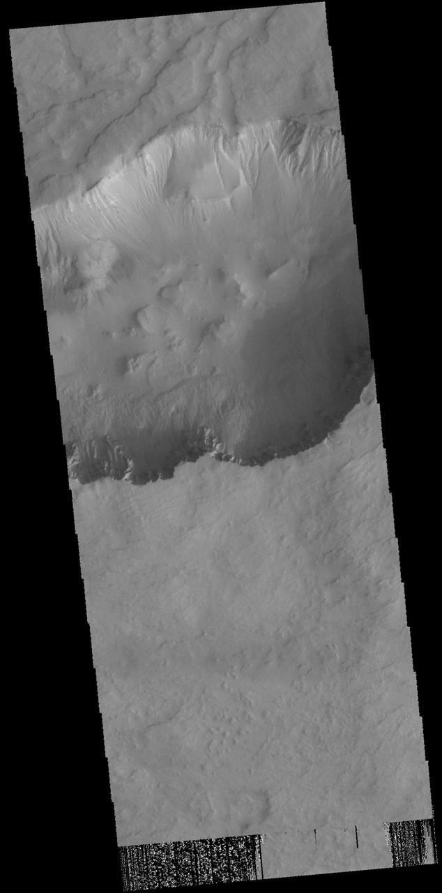 Numerous gullies are visible in this image captured by NASA 2001 Mars Odyssey spacecraft of Asimov Crater.  Orbit Number: 57869 Latitude: -47.6632 Longitude: 5.48151 Instrument: VIS Captured: 2014-12-30 15:59  http://photojournal.jpl.nasa.gov/catalog/PIA19197