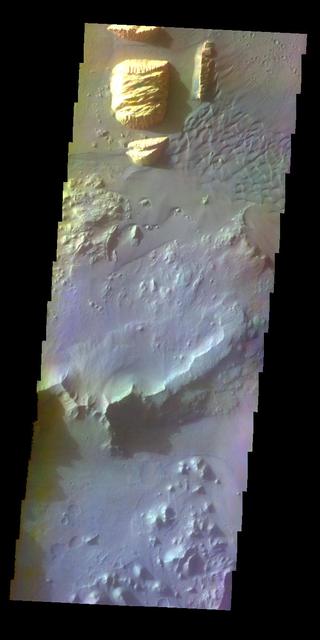 The THEMIS VIS camera contains 5 filters. The data from different filters can be combined in multiple ways to create a false color image. This false color image from NASA 2001 Mars Odyssey spacecraft shows part of Ganges Chasma.  Orbit Number: 4359 Latitude: -8.7239 Longitude: 313.334 Instrument: VIS Captured: 2002-12-08 08:54  http://photojournal.jpl.nasa.gov/catalog/PIA19210