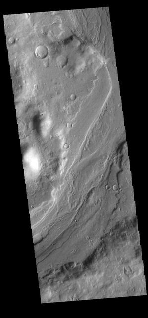 This image captured by NASA 2001 Mars Odyssey spacecraft shows a section of Reull Vallis, a major channel that empties into Hellas Planitia.  Orbit Number: 58040 Latitude: -39.0604 Longitude: 111.349 Instrument: VIS Captured: 2015-01-13 17:56  http://images.nasa.gov/#/details-PIA19226.html