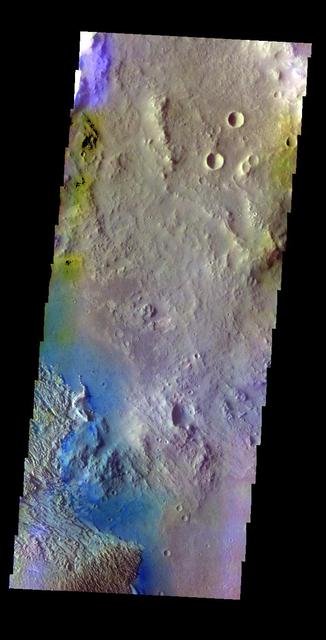 The THEMIS VIS camera contains 5 filters. The data from different filters can be combined in multiple ways to create a false color image. This false color image from NASA 2001 Mars Odyssey spacecraft shows part of the floor of Becquerel Crater.