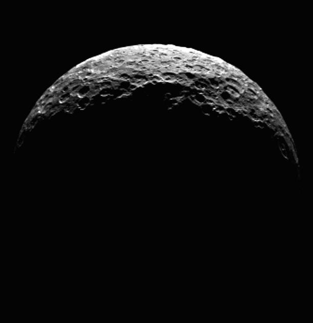 This frame from an animation shows the north pole of dwarf planet Ceres as seen by the Dawn spacecraft on April 10, 2015. Dawn was at a distance of 21,000 miles 33,000 kilometers when its framing camera took these images. http://photojournal.jpl.nasa.gov/catalog/PIA19317