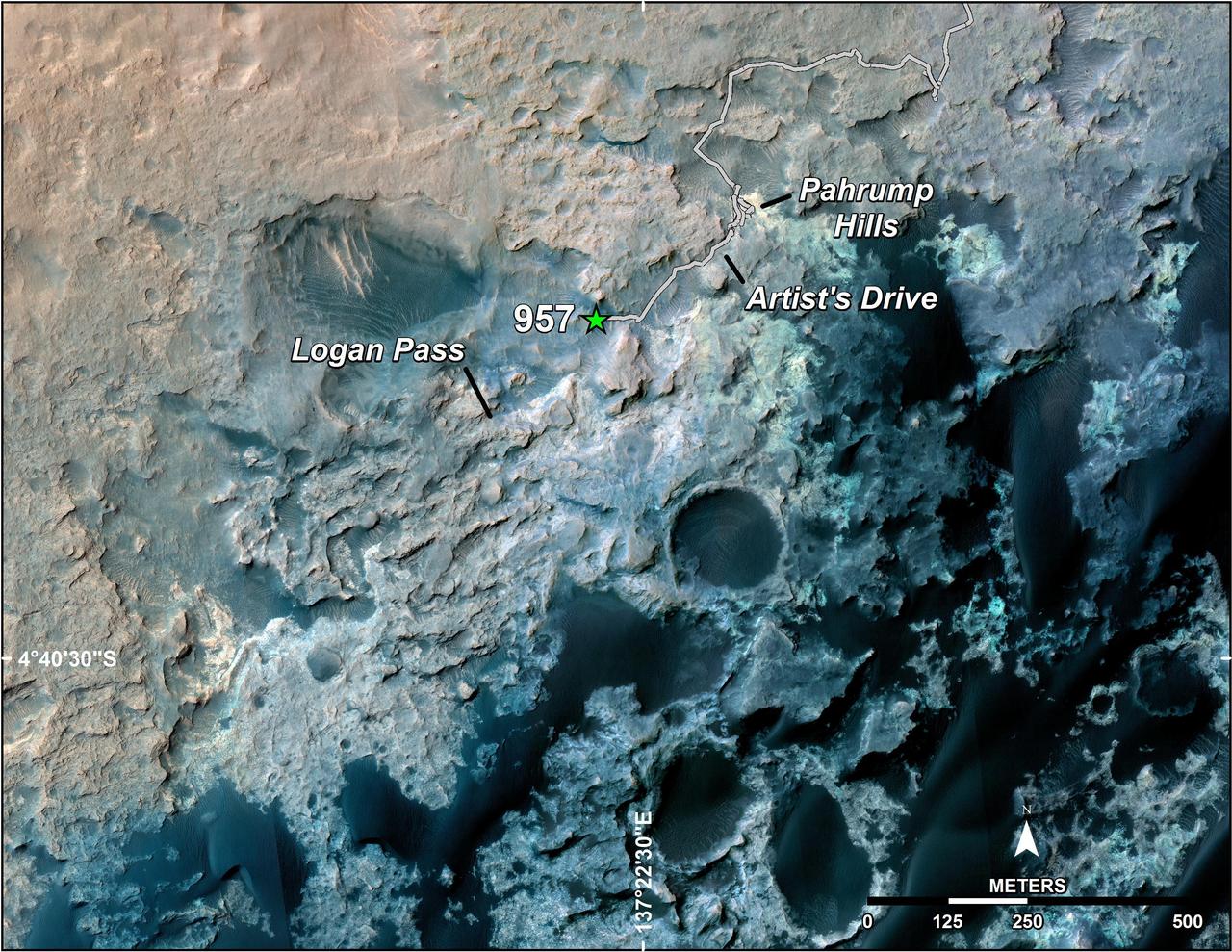 A green star marks the location of NASA's Curiosity Mars rover after a drive on the mission's 957th Martian day, or sol, (April 16, 2015). The map covers an area about 1.25 miles (2 kilometers) wide.  Curiosity landed on Mars in August 2012. The drive on Sol 957 brought the mission's total driving distance past the 10-kilometer mark (6.214 miles). The rover is passing through a series of shallow valleys on a path from the "Pahrump Hills" outcrop, which it investigated for six months, toward its next science destination, called "Logan Pass."  The rover's traverse line enters this map at the location Curiosity reached in mid-July 2014.  The base map uses imagery from the High Resolution Imaging Science Experiment (HiRISE) camera on NASA's Mars Reconnaissance Orbiter.  http://photojournal.jpl.nasa.gov/catalog/PIA19390
