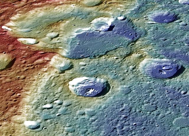 This image from NASA MESSENGER spacecraft provides a perspective view of the center portion of Carnegie Rupes, a large tectonic landform, which cuts through Duccio crater. The image shows the terrain (variations in topography) as measured by the MLA instrument and surface mapped by the MDIS instrument. The image was color-coded to highlight the variations in topography (red = high standing terrain, blue = low lying terrain). Tectonic landforms such as Carnegie Rupes form on Mercury as a response to interior planetary cooling, resulting in the overall shrinking of the planet. To make this graphic, 48 individual MDIS images were used as part of the mosaic. Instruments: Mercury Dual Imaging System (MDIS) and Mercury Laser Altimeter (MLA) Latitude: 57.1° Longitude: 304.0° E Scale: Duccio crater has a diameter of roughly 105 kilometers (65 miles) Height: Portions of Carnegie Rupes are nearly 2 kilometers (1.2 miles) in height Orientation: North is roughly to the left of the image http://photojournal.jpl.nasa.gov/catalog/PIA19422