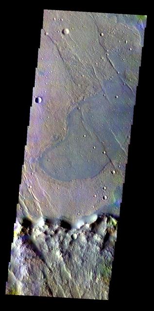 The THEMIS VIS camera contains 5 filters. Data from different filters can be combined in multiple ways to create a false color image. This image from NASA 2001 Mars Odyssey spacecraft shows lava flow from Solis Planum has entered an unnamed crater. Orbit Number: 6745 Latitude: -29.5791 Longitude: 261.582 Instrument: VIS Captured: 2003-06-22 18:44 http://photojournal.jpl.nasa.gov/catalog/PIA19429