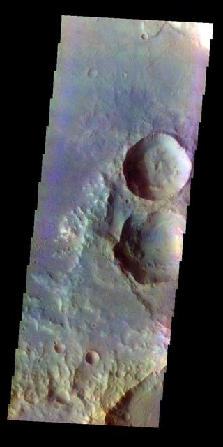 The THEMIS VIS camera contains 5 filters. The data from different filters can be combined in multiple ways to create a false color image. This false color image from NASA 2001 Mars Odyssey spacecraft shows craters in Terra Cimmeria. Orbit Number: 7236 Latitude: -21.6412 Longitude: 142.906 Instrument: VIS Captured: 2003-08-02 04:43 http://photojournal.jpl.nasa.gov/catalog/PIA19454