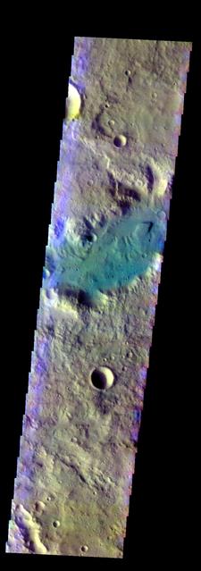 The THEMIS VIS camera contains 5 filters. The data from different filters can be combined in multiple ways to create a false color image. This false color image from NASA 2001 Mars Odyssey spacecraft shows part of an unnamed channel in Terra Cimmeria.