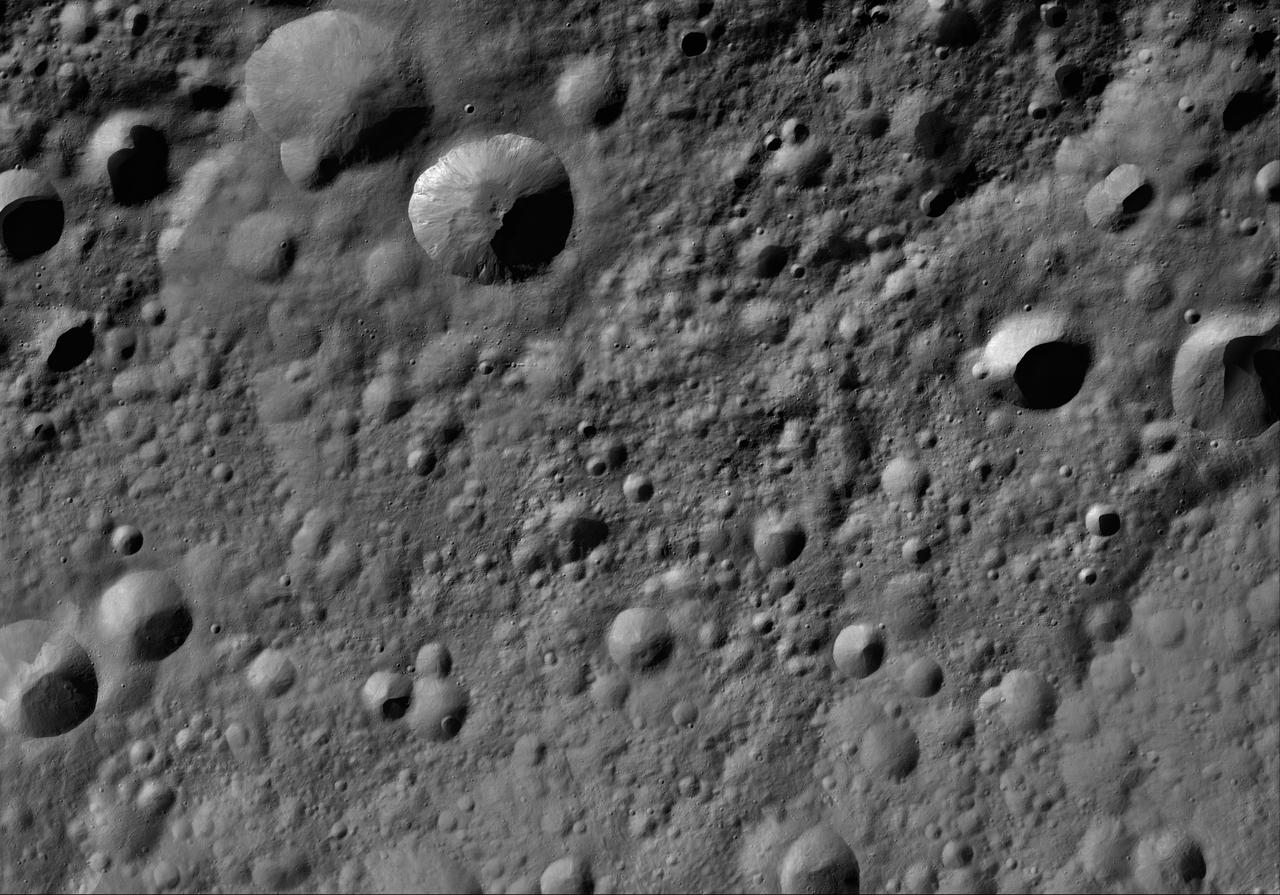 This image of Licinia AV-L-08, from the atlas of the giant asteroid Vesta, was created from images taken as NASA Dawn mission flew around the object, also known as a protoplanet. The set of maps was created from mosaics of10,000 images from Dawn's framing camera instrument, taken at a low altitude of about 130 miles (210 kilometers). This map is mostly at a scale about that of regional road touring maps, where every inch of map is equivalent to a little more than 3 miles of asteroid (one centimeter equals 2 kilometers). http://photojournal.jpl.nasa.gov/catalog/PIA19512