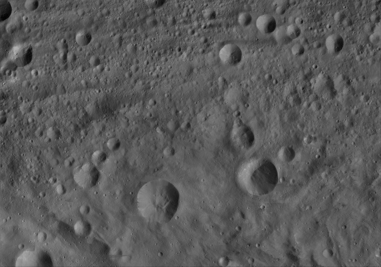 This image of Serena AV-L-18, from the atlas of the giant asteroid Vesta, was created from images taken as NASA Dawn mission flew around the object, also known as a protoplanet. The set of maps was created from mosaics of10,000 images from Dawn's framing camera instrument, taken at a low altitude of about 130 miles (210 kilometers). This map is mostly at a scale about that of regional road touring maps, where every inch of map is equivalent to a little more than 3 miles of asteroid (one centimeter equals 2 kilometers). http://photojournal.jpl.nasa.gov/catalog/PIA19522