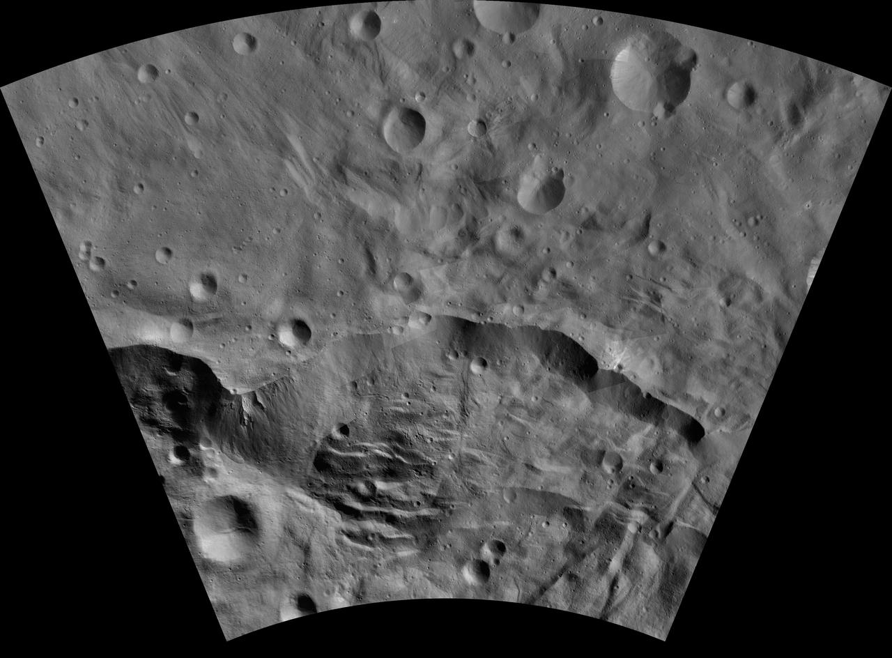 This image of Matronalia AV-L-25, from the atlas of the giant asteroid Vesta, was created from images taken as NASA Dawn mission flew around the object, also known as a protoplanet. The set of maps was created from mosaics of10,000 images from Dawn's framing camera instrument, taken at a low altitude of about 130 miles (210 kilometers). This map is mostly at a scale about that of regional road touring maps, where every inch of map is equivalent to a little more than 3 miles of asteroid (one centimeter equals 2 kilometers). http://photojournal.jpl.nasa.gov/catalog/PIA19529