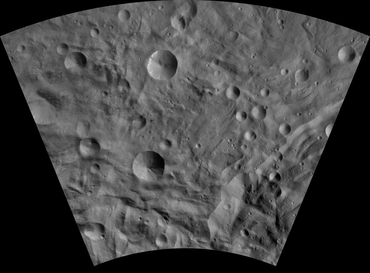 This image of Sextilia AV-L-26, from the atlas of the giant asteroid Vesta, was created from images taken as NASA Dawn mission flew around the object, also known as a protoplanet. The set of maps was created from mosaics of10,000 images from Dawn's framing camera instrument, taken at a low altitude of about 130 miles (210 kilometers). This map is mostly at a scale about that of regional road touring maps, where every inch of map is equivalent to a little more than 3 miles of asteroid (one centimeter equals 2 kilometers). http://photojournal.jpl.nasa.gov/catalog/PIA19530