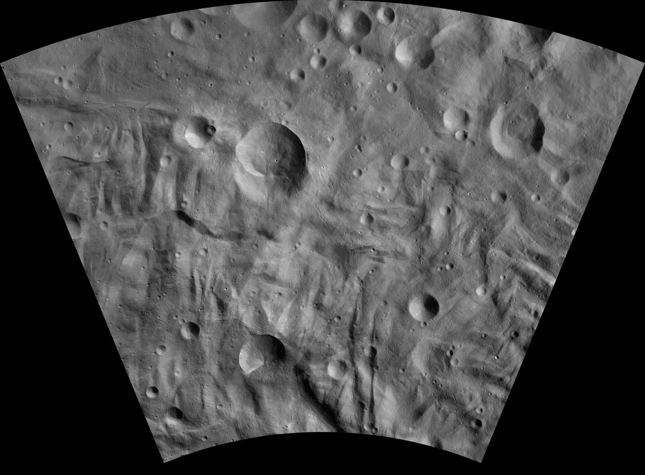 This image of Eusebia AV-L-27, from the atlas of the giant asteroid Vesta, was created from images taken as NASA Dawn mission flew around the object, also known as a protoplanet. The set of maps was created from mosaics of10,000 images from Dawn's framing camera instrument, taken at a low altitude of about 130 miles (210 kilometers). This map is mostly at a scale about that of regional road touring maps, where every inch of map is equivalent to a little more than 3 miles of asteroid (one centimeter equals 2 kilometers). http://photojournal.jpl.nasa.gov/catalog/PIA19531