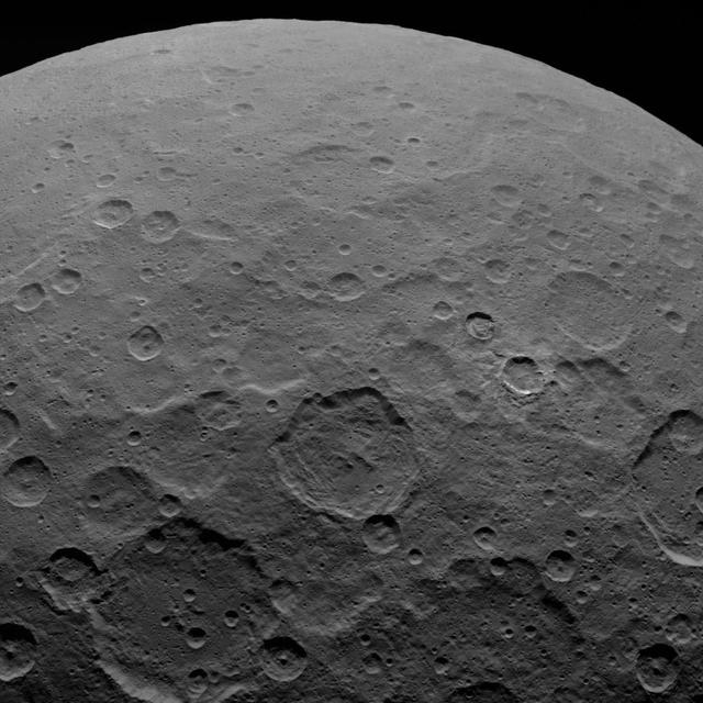 This image, taken by NASA Dawn spacecraft, shows dwarf planet Ceres from an altitude of 2,700 miles 4,400 kilometers. The image, with a resolution of 1,400 feet 410 meters per pixel, was taken on June 7, 2015.  http://photojournal.jpl.nasa.gov/catalog/PIA19580