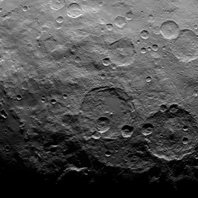 This image, taken by NASA's Dawn spacecraft, shows a portion of the southern hemisphere of dwarf planet Ceres from an altitude of 2,700 miles (4,400 kilometers). The image, with a resolution of 1,400 feet (410 meters) per pixel, was taken on June 16, 2015.  http://photojournal.jpl.nasa.gov/catalog/PIA19585