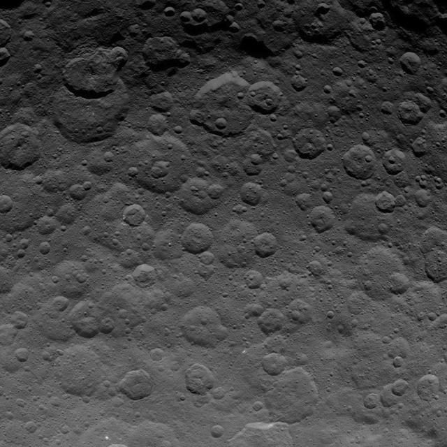 This image, taken by NASA Dawn spacecraft on June 24, 2015, shows dwarf planet Ceres from an altitude of 2,700 miles 4,400 kilometers with a resolution of 1,400 feet 410 meters per pixel.  http://photojournal.jpl.nasa.gov/catalog/PIA19613