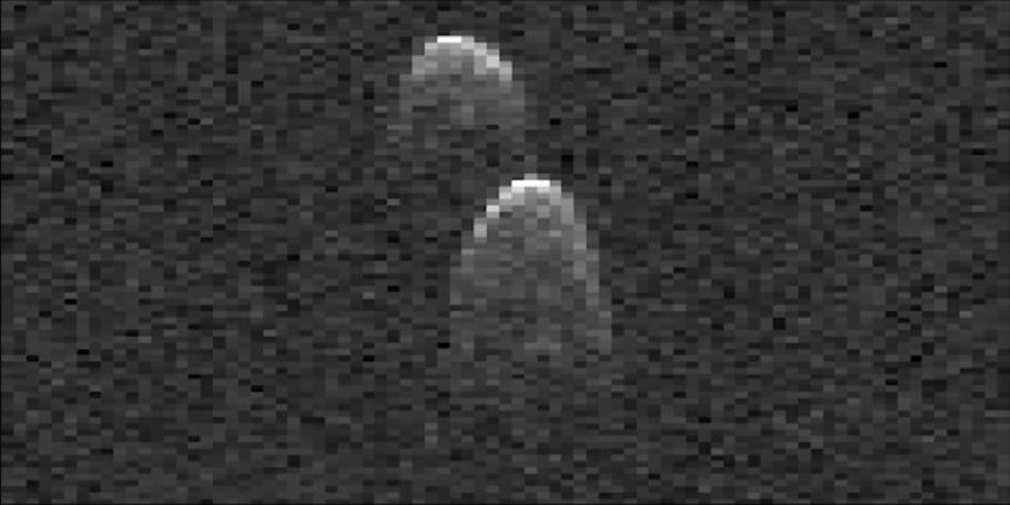 This frame from a movie made from radar images of asteroid 1999 JD6 was collected by NASA scientists on July 25, 2015. The images show the rotation of the asteroid, which made its closest approach on July 24 at 9:55 p.m. PDT (12:55 a.m. EDT on July 25) at a distance of about 4.5 million miles (7.2 million kilometers, or about 19 times the distance from Earth to the moon).  The asteroid appears to be a contact binary -- an asteroid with two lobes that are stuck together. The radar images show the asteroid is highly elongated, with a length of approximately 1.2 miles (2 kilometers) on its long axis.  These images are radar echoes, which are more like a sonogram than a photograph. The views were obtained by pairing NASA's 230-foot-wide (70-meter) Deep Space Network antenna at Goldstone, California, with the 330-foot (100-meter) National Science Foundation Green Bank Telescope in West Virginia. Using this approach, the Goldstone antenna beams a radar signal at an asteroid and Green Bank receives the reflections. The technique, referred to as a bistatic observation, dramatically improves the amount of detail that can be seen in radar images. The new views obtained with the technique show features as small as about 25 feet (7.5 meters) wide.   http://photojournal.jpl.nasa.gov/catalog/PIA19646