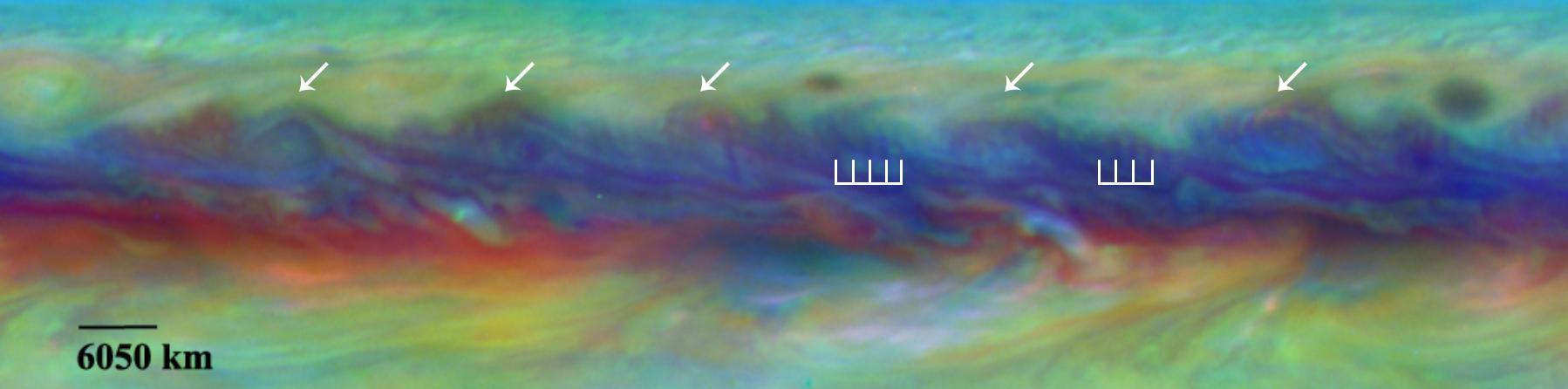 Scientists spotted a rare wave in Jupiter North Equatorial Belt that had been seen there only once before in this false-color close-up from NASA Hubble Telescope.  In Jupiter's North Equatorial Belt, scientists spotted a rare wave that had been seen there only once before. It is similar to a wave that sometimes occurs in Earth's atmosphere when cyclones are forming. This false-color close-up of Jupiter shows cyclones (arrows) and the wave (vertical lines).  http://photojournal.jpl.nasa.gov/catalog/PIA19659