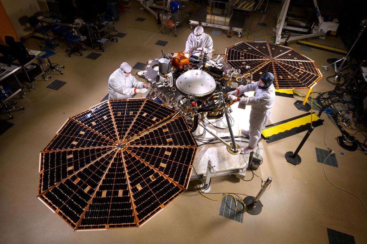 The solar arrays on NASA's InSight lander are deployed in this test inside a clean room at Lockheed Martin Space Systems, Denver. This configuration is how the spacecraft will look on the surface of Mars. The image was taken on April 30, 2015.  InSight, for Interior Exploration Using Seismic Investigations, Geodesy and Heat Transport, is scheduled for launch in March 2016 and landing in September 2016. It will study the deep interior of Mars to advance understanding of the early history of all rocky planets, including Earth.  Note: After thorough examination, NASA managers have decided to suspend the planned March 2016 launch of the Interior Exploration using Seismic Investigations Geodesy and Heat Transport (InSight) mission. The decision follows unsuccessful attempts to repair a leak in a section of the prime instrument in the science payload.  http://photojournal.jpl.nasa.gov/catalog/PIA19664
