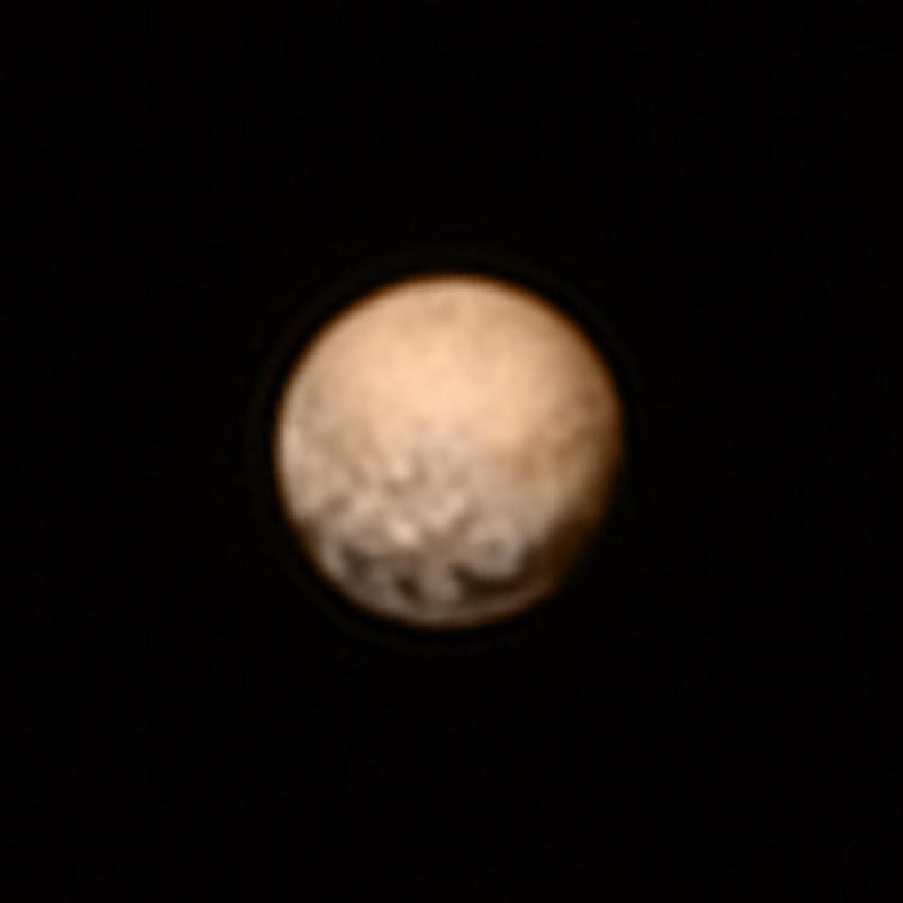 This color version of NASA's New Horizons Long Range Reconnaissance Imager (LORRI) picture of Pluto taken July 3, 2015, was created by adding color data from the Ralph instrument gathered earlier in the mission. The LORRI image was taken from a range of 7.8 million miles (12.5 million km), with a central longitude of 19°.   http://photojournal.jpl.nasa.gov/catalog/PIA19699