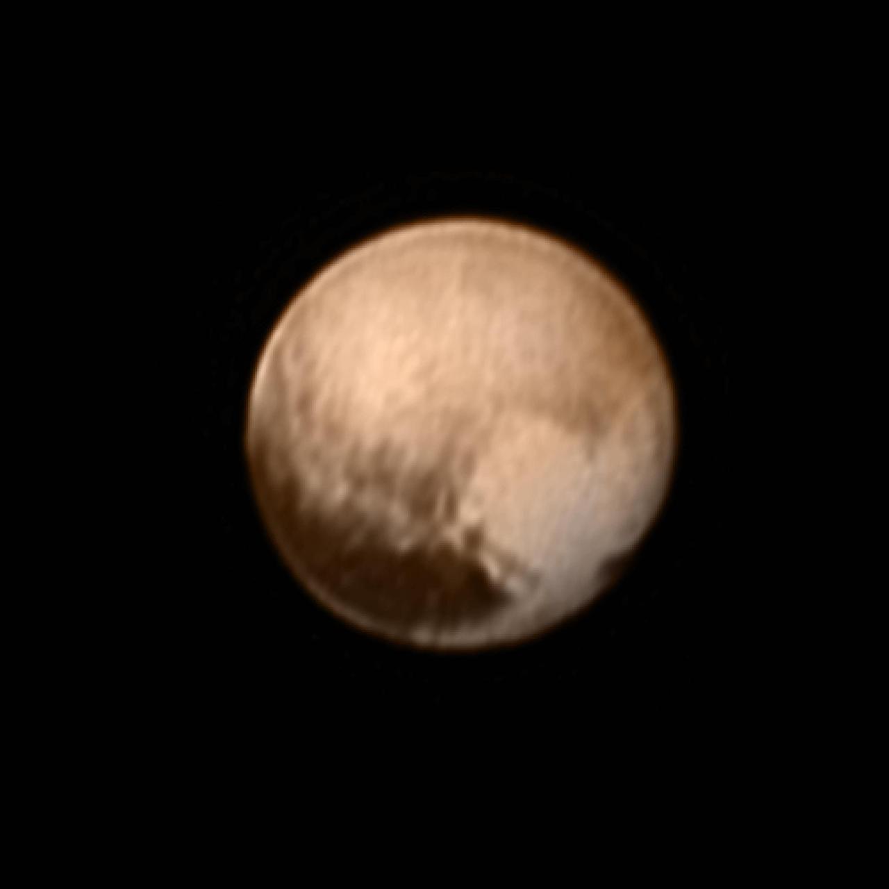 In the early morning hours of July 8, 2015, mission scientists received this new view of Pluto -- the most detailed yet returned by the Long Range Reconnaissance Imager (LORRI) aboard New Horizons. The image was taken on July 7, when the NASA spacecraft was just under 5 million miles (8 million kilometers) from Pluto, and is the first to be received since the July 4 anomaly that sent the spacecraft into safe mode.  This view is centered roughly on the area that will be seen close-up during New Horizons' July 14 closest approach. This side of Pluto is dominated by three broad regions of varying brightness. Most prominent are an elongated dark feature at the equator, informally known as "the whale," and a large heart-shaped bright area measuring some 1,200 miles (2,000 kilometers) across on the right. Above those features is a polar region that is intermediate in brightness.   http://photojournal.jpl.nasa.gov/catalog/PIA19702