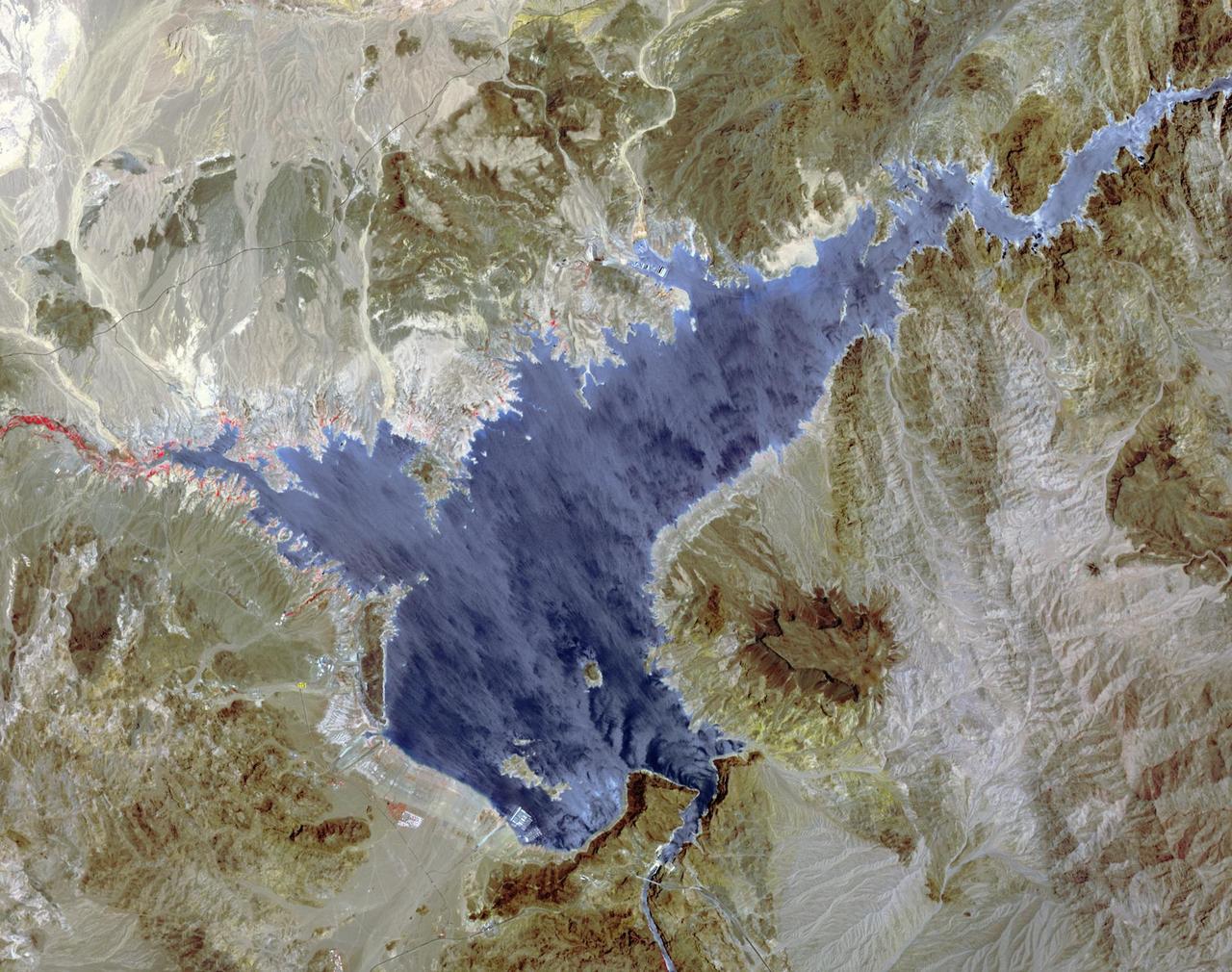 Lake Mead supplies water for Arizona, California, Mexico, and other western states. On June 23, the water level fell to 1075 feet, a record low. In 2000, for comparison, the water level was at 1214 feet. A 15-year drought and increased demands for water are to blame for the critical status of the water supply. The difference in 15 years is seen in this pair of images of the western part of Lake Mead, acquired June 21, 2000 by Landsat 7, and June 21, 2015 by ASTER. The images cover an area of 22.5 x 28.5 km, and are located at 36.1 degrees north, 114.7 degrees west.  http://photojournal.jpl.nasa.gov/catalog/PIA19731