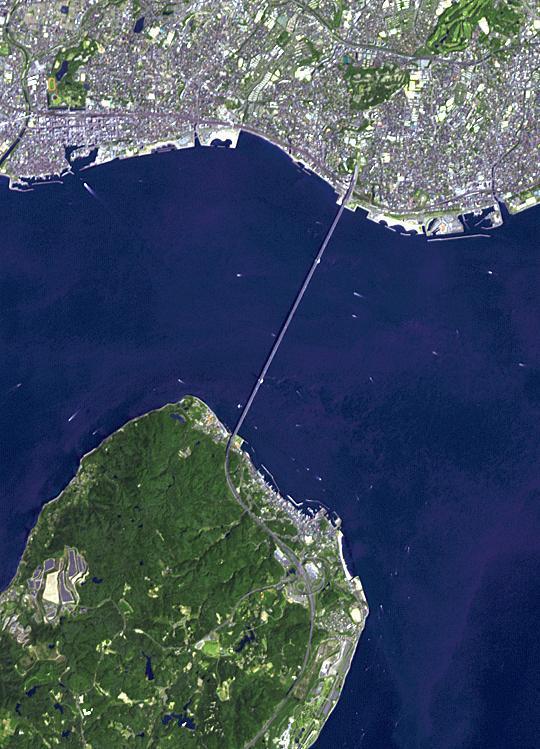 The Akashi Kaikyo Bridge in Japan has the longest central span of any suspension bridge in the world at 1991 m. The total length of the bridge is 3911 m. It links the city of Kobe on the mainland of Honshu to Iwaya on Awaji Island, crossing the busy Akashi Strait. The image was acquired April 26, 2014, covers an area of 8.1 by 11.2 km, and is located at 34.6 degrees north, 135 degrees east.  http://photojournal.jpl.nasa.gov/catalog/PIA19747