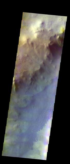 The THEMIS VIS camera contains 5 filters. The data from different filters can be combined in multiple ways to create a false color image. These false color images may reveal subtle variations of the surface not easily identified in a single band image. Today's false color image shows dunes of the floor of Keeler Crater in Terra Sirenum.  Orbit Number: 9917 Latitude: -60.2955 Longitude: 208.203 Instrument: VIS Captured: 2004-03-09 21:56  http://photojournal.jpl.nasa.gov/catalog/PIA19751