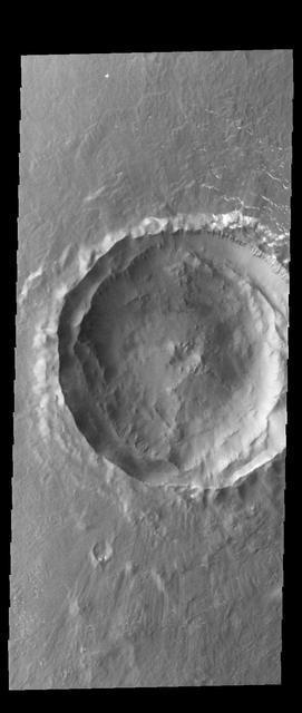 This relatively young crater is located on the northern plains of Arcadia Planitia. Orbit Number: 60388 Latitude: 61.6777 Longitude: 228.91 Instrument: VIS Captured: 2015-07-26 03:01 http://photojournal.jpl.nasa.gov/catalog/PIA19766