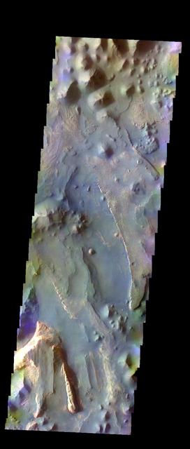 The THEMIS VIS camera contains 5 filters. The data from different filters can be combined in multiple ways to create a false color image. These false color images may reveal subtle variations of the surface not easily identified in a single band image. Today's false color image shows part of Aureum Chaos. Orbit Number: 10537 Latitude: -3.64083 Longitude: 332.87 Instrument: VIS Captured: 2004-04-29 22:43 http://photojournal.jpl.nasa.gov/catalog/PIA19770