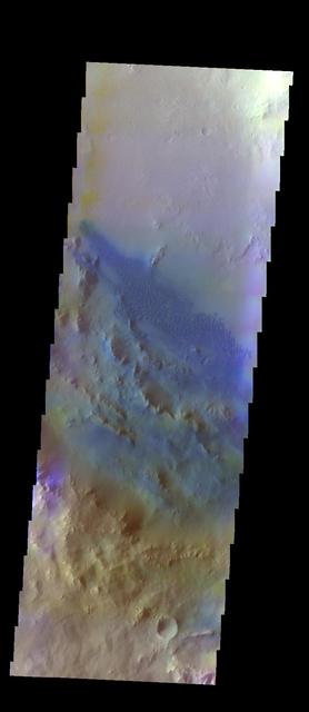 The THEMIS VIS camera contains 5 filters. The data from different filters can be combined in multiple ways to create a false color image. These false color images may reveal subtle variations of the surface not easily identified in a single band image. Today's false color image shows some of the dunes located on the floor of Pettit Crater.  Orbit Number: 10953 Latitude: 11.7976 Longitude: 185.884 Instrument: VIS Captured: 2004-06-03 06:37  http://photojournal.jpl.nasa.gov/catalog/PIA19777