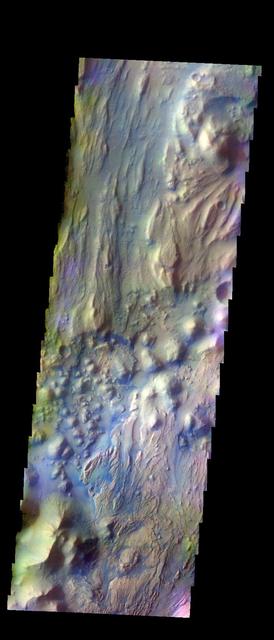 The THEMIS VIS camera contains 5 filters. The data from different filters can be combined in multiple ways to create a false color image. This image from NASA 2001 Mars Odyssey spacecraft shows the beginning of Ares Vallis at the edge of Iani Chaos.