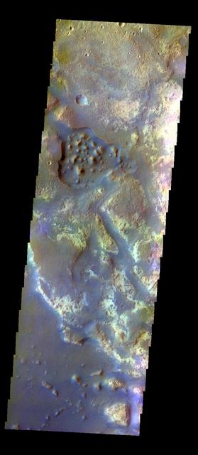 The THEMIS VIS camera contains 5 filters. The data from different filters can be combined in multiple ways to create a false color image. This image from NASA 2001 Mars Odyssey spacecraft shows where Mawrth Vallis empties into Chryse Planitia.