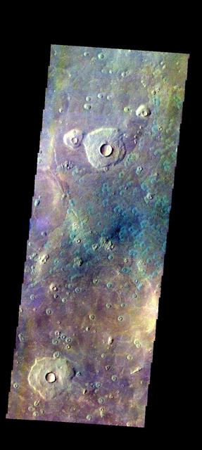 The THEMIS VIS camera contains 5 filters. The data from different filters can be combined in multiple ways to create a false color image. These false color images may reveal subtle variations of the surface not easily identified in a single band image. Today's false color image shows part of Acidalia Planitia.  Orbit Number: 11833 Latitude: 45.9694 Longitude: 5.75958 Instrument: VIS Captured: 2004-08-14 17:19  http://photojournal.jpl.nasa.gov/catalog/PIA19792