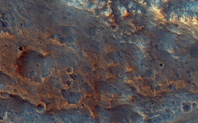 NASA image: A Fan-Shaped Landform and Nearby Light-Toned Material