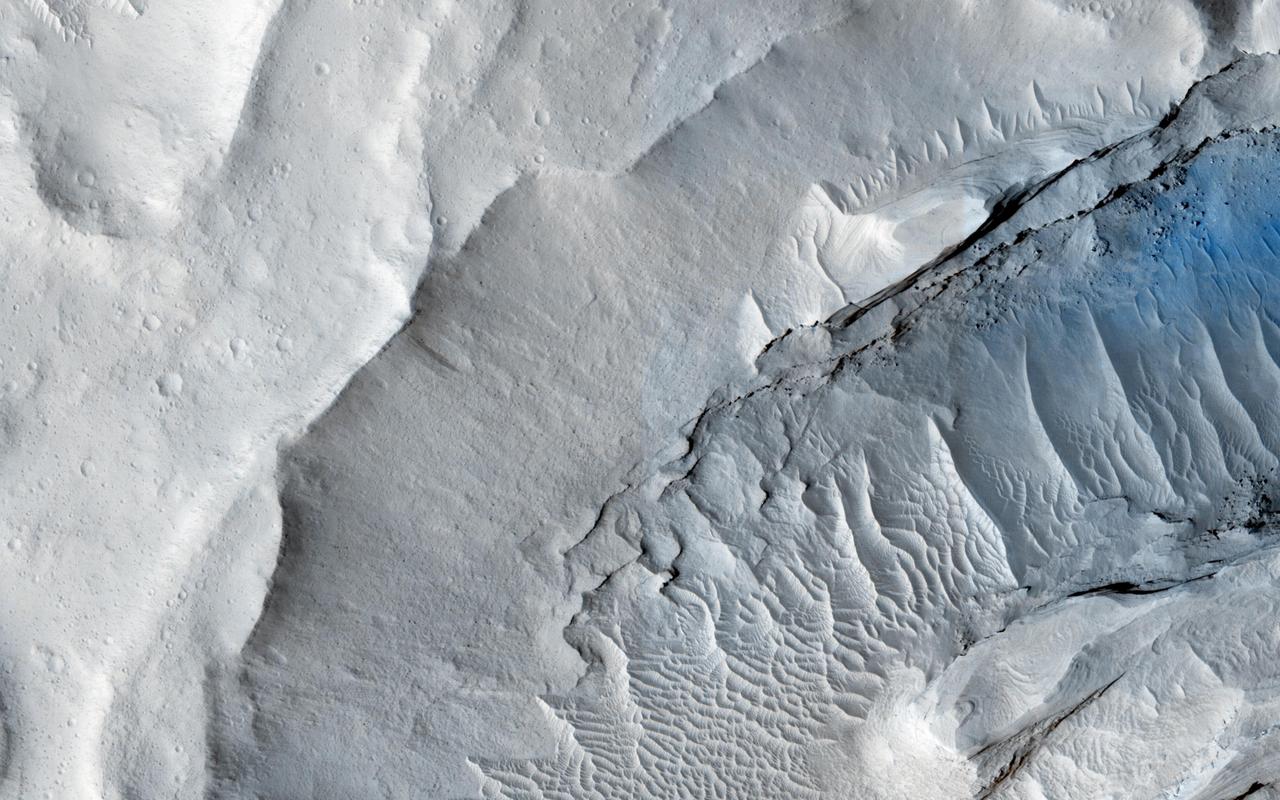 A delta is a pile of sediment dumped by a river where it enters a standing body of water. Evidence for deltas that formed billions of years ago on Mars has been mounting in recent years.   One line of evidence not yet investigated is to search for what are called clinoforms. In geology, a clinoform refers to a steep slope of sediment on the outer margin of a delta. This image seeks to test whether those features are visible and help confirm that Mars in ancient times had a standing body of water in this location.  http://photojournal.jpl.nasa.gov/catalog/PIA19848
