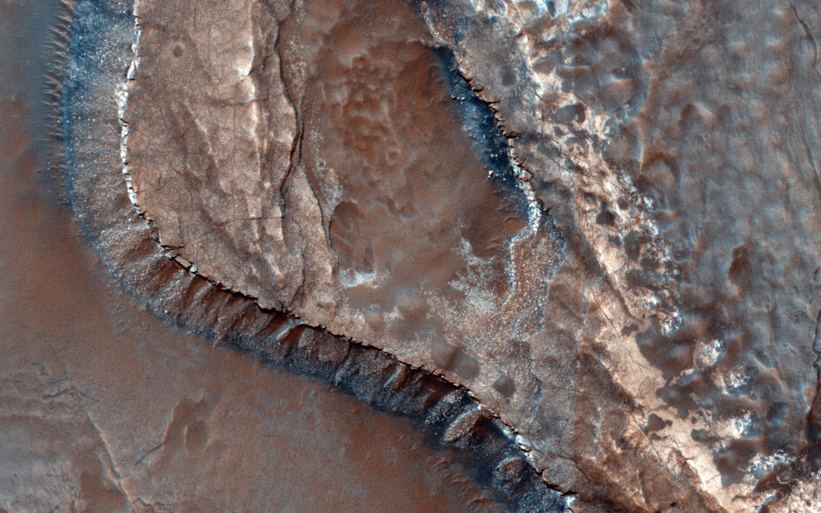 A Channel System and Patterned Ground near Hellas Basin