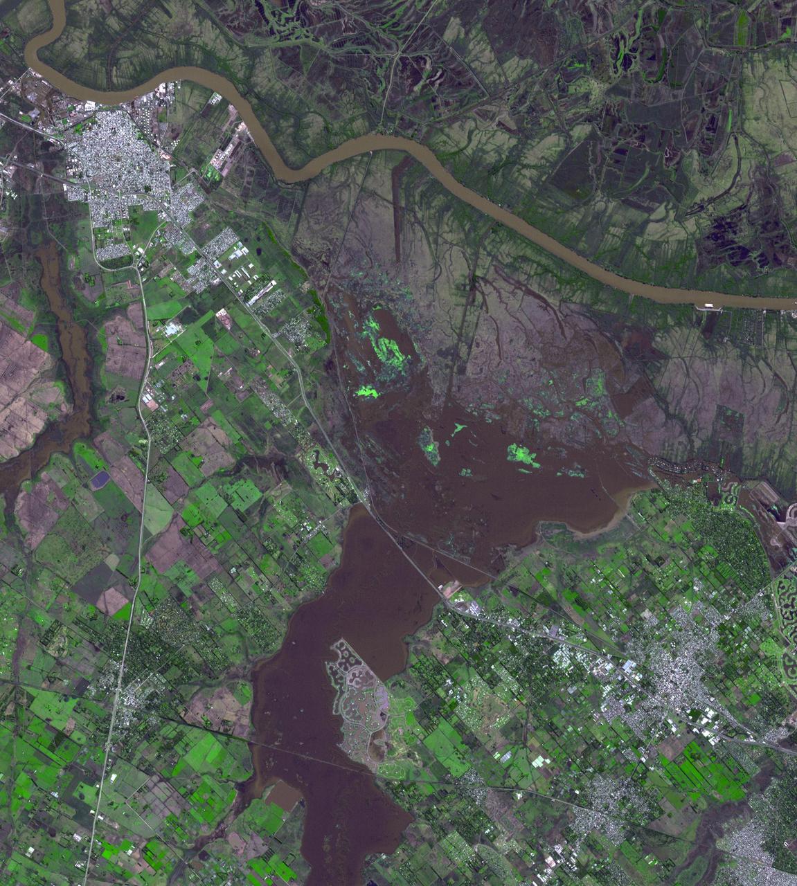 Northwest of Buenos Aires, Argentina, seven straight days of torrential rains of up to 16 inches 40 centimeters in August 2015 resulted in flooding between the cities of Escobar and Campana as seen by NASA Terra spacecraft. The flooding has since eased, allowing some evacuated residents of the 39 affected municipalities to return to their homes. The flooding was captured in this satellite image acquired Aug. 16, 2015, by the Advanced Spaceborne Thermal Emission and Reflection Radiometer (ASTER) instrument on NASA's Terra spacecraft. The image covers an area of 16.7 by 17.4 miles (26.9 by 28 kilometers), and is located at 34.2 degrees south, 58.6 degrees west.  http://photojournal.jpl.nasa.gov/catalog/PIA19871