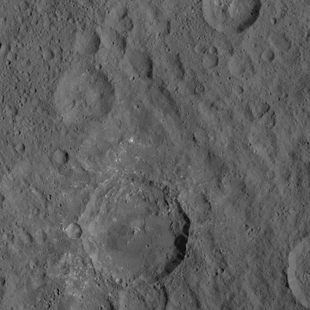 This image, taken by NASA Dawn spacecraft, shows a portion of Ceres at mid-latitudes from an altitude of 915 miles 1,470 kilometers. The image, with a resolution of 450 feet 140 meters per pixel, was taken on August 21, 2015.  http://photojournal.jpl.nasa.gov/catalog/PIA19885