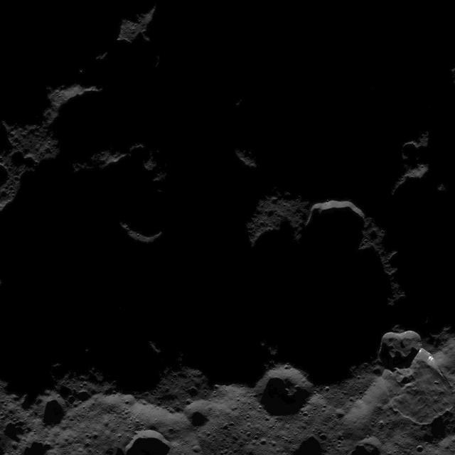 This image, taken by NASA's Dawn spacecraft, shows the surface of dwarf planet Ceres from an altitude of 915 miles (1,470 kilometers). The image, with a resolution of 450 feet (140 meters) per pixel, was taken on August 25, 2015.  http://photojournal.jpl.nasa.gov/catalog/PIA19895