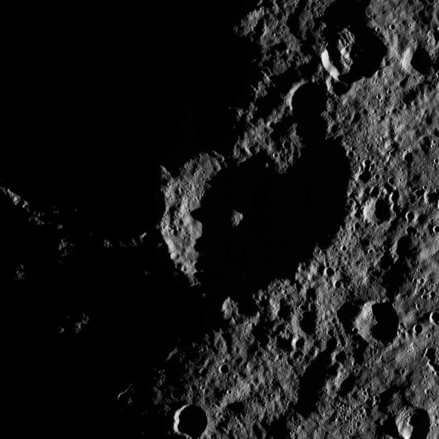 This image, taken by NASA Dawn spacecraft, shows the surface of dwarf planet Ceres from an altitude of 915 miles 1,470 kilometers. The image, with a resolution of 450 feet 140 meters per pixel, was taken on August 26, 2015.