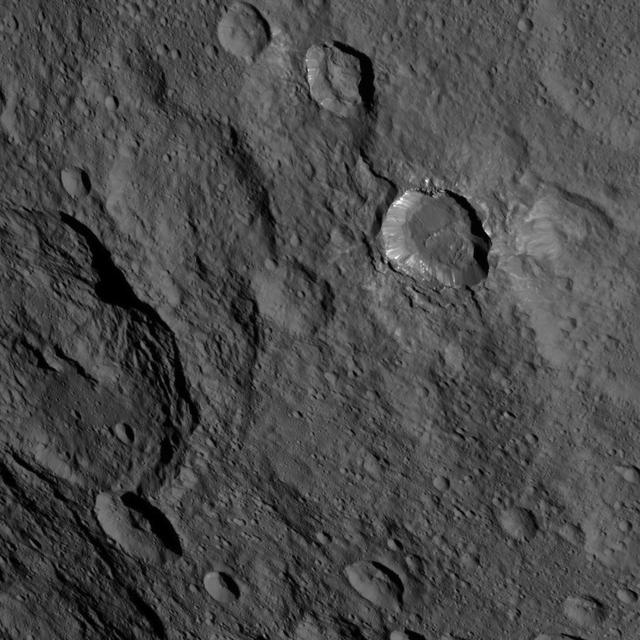 This image, taken by NASA's Dawn spacecraft, shows a portion of the southern hemisphere of dwarf planet Ceres from an altitude of 915 miles (1,470 kilometers). The image was taken on Sept. 20, 2015, and has a resolution of 450 feet (140 meters) per pixel. Toharu crater, named for the Pawnee god of food and vegetation, can be seen at left. Its diameter is approximately 54 miles (87 kilometers). http://photojournal.jpl.nasa.gov/catalog/PIA19981