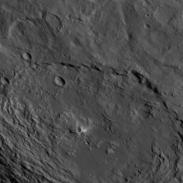 This image, taken by NASA's Dawn spacecraft, shows a portion of the southern hemisphere of dwarf planet Ceres from an altitude of 915 miles (1,470 kilometers). The image was taken on Sept. 28, 2015, and has a resolution of 450 feet (140 meters) per pixel. Urvara crater, named for the Indian and Iranian deity of plants and fields, is featured. Its diameter is 101 miles (163 kilometers). http://photojournal.jpl.nasa.gov/catalog/PIA19992