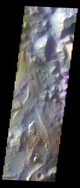 The THEMIS VIS camera contains 5 filters. The data from different filters can be combined in multiple ways to create a false color image. These false color images may reveal subtle variations of the surface not easily identified in a single band image. Today's false color image shows part of Aureum Chaos. Orbit Number: 12384 Latitude: -3.1928 Longitude: 332.676 Instrument: VIS Captured: 2004-09-29 00:24 http://photojournal.jpl.nasa.gov/catalog/PIA20076