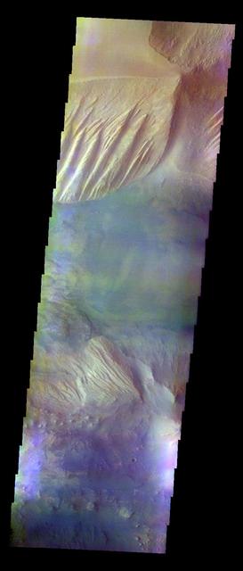 The THEMIS VIS camera contains 5 filters. The data from different filters can be combined in multiple ways to create a false color image. This image from NASA 2001 Mars Odyssey spacecraft shows part of Candor Chasma. Orbit Number: 14532 Latitude: -6.98504 Longitude: 288.916 Instrument: VIS Captured: 2005-03-24 20:53 http://photojournal.jpl.nasa.gov/catalog/PIA20087