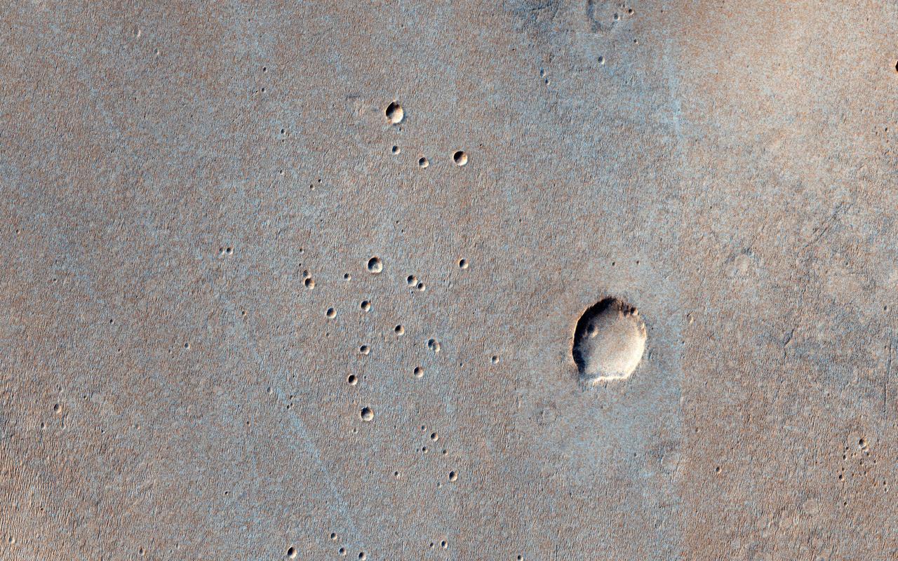 This image from NASA Mars Reconnaissance Orbiter spacecraft is of a landing site that the flattest, safest place on Mars: part of Meridiani Planum, close to where the Opportunity rover landed. In March 2016, the European Space Agency in partnership with Roscosmos will launch the ExoMars Trace Gas Orbiter. This orbiter will also carry an Entry, Descent, and Landing Demonstration Module (EDM): a lander designed primarily to demonstrate the capability to land on Mars. The EDM will survive for only a few days, running on battery power, but will make a few environmental measurements. The landing site is the flattest, safest place on Mars: part of Meridiani Planum, close to where the Opportunity rover landed. This image shows what this terrain is like: very flat and featureless. A full-resolution sample reveals the major surface features: small craters and wind ripples. HiRISE has been imaging the landing site region in advance of the landing, and will re-image the site after landing to identify the major pieces of hardware: heat shield, backshell with parachute, and the lander itself. The distribution of these pieces will provide information about the entry, descent and landing. http://photojournal.jpl.nasa.gov/catalog/PIA20159