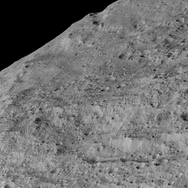 This view of Ceres, taken by NASA Dawn spacecraft on December 10, 2015, shows an area in the southern mid-latitudes of the dwarf planet. It is located in an area around a crater chain called Samhain Catena.