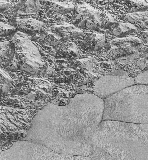NASA image: The Mountainous Shoreline of Sputnik Planum