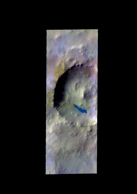 The THEMIS camera contains 5 filters. The data from different filters can be combined in multiple ways to create a false color image. These false color images may reveal subtle variations of the surface not easily identified in a single band image. Today's false color images shows an unnamed crater in Noachis Terra. The "dark blue" material is probably basaltic sands. Orbit Number: 17811 Latitude: -77.9919 Longitude: 0.491743 Instrument: VIS Captured: 2005-12-19 20:35. http://photojournal.jpl.nasa.gov/catalog/PIA20225